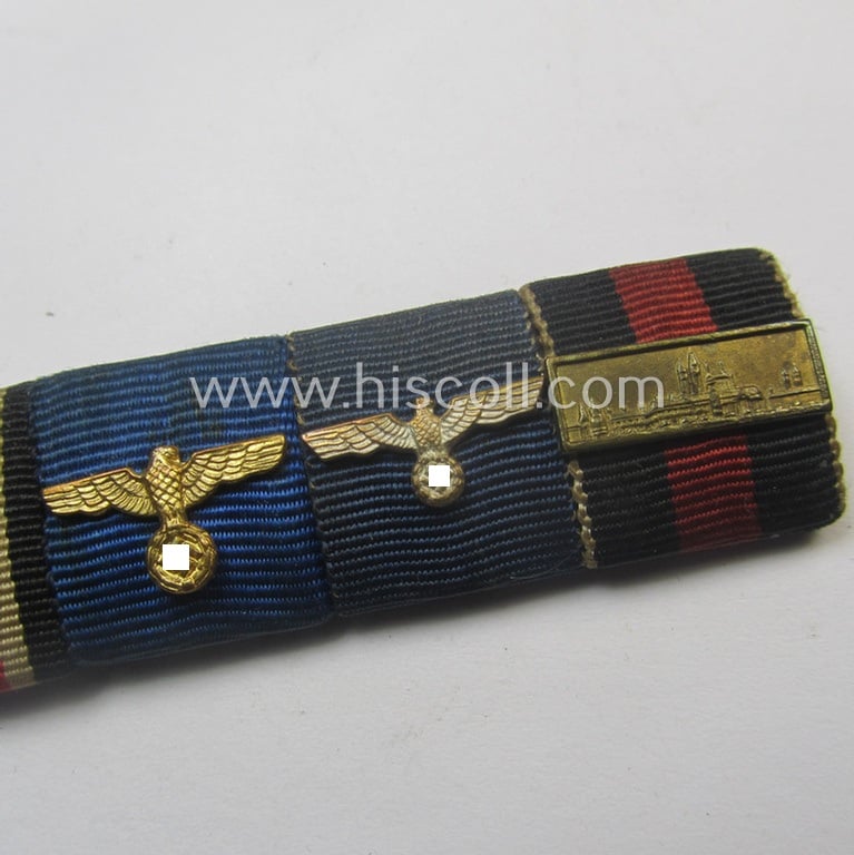 4-pieced, WWII- (ie. TR-) period ribbon-bar (ie. 'Feld- o. Bandspange') showing various WWII-period awards (amongst which a Czech 'Anschluss'-medal with attached tiny but very detailed 'PB'-bar!)
