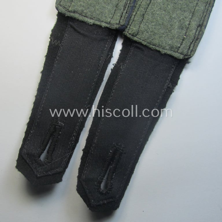 Pair of Waffen-SS, NCO-type shoulderstraps as piped in the darker-blue-coloured branchcolour as was intended for usage by an: 'SS-Unterscharführer' who served within the: 'SS-Sanitäts-Trpn.'