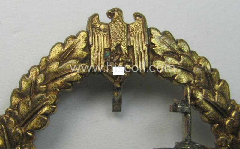 WH (Kriegsmarine) 'Zerstörerkriegsabzeichen' being a maker-marked example as executed in 'Buntmetall' (ie. 'Tombak') as was produced by the desirable maker (ie. 'Hersteller'): 'GWL' (ie. 'Gebr. Wegerhoff')