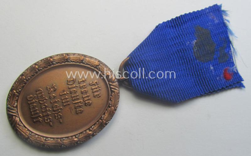 'Regular-weight', RAD (ie. 'Reichsarbeitsdienst'): 'Dienstauszeichnung 4. Stufe für Männer' as was intended for 4 years loyal-service and that comes mounted onto its period (albeit shortened) ribbon (ie. 'Bandabschnitt')