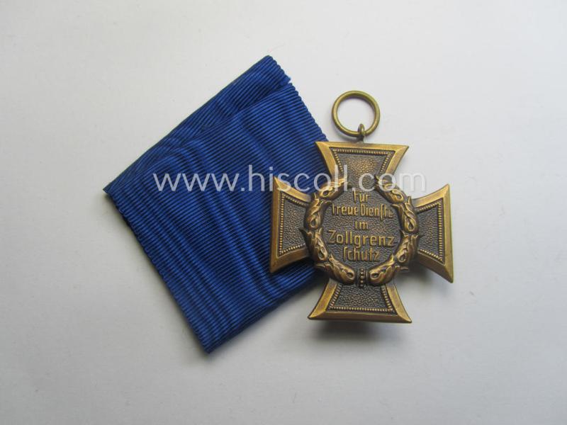 'Zollgrenzschütz-Ehrenzeichen' (or: customs loyal-service medal) that comes together with its full-length ribbon (ie. 'Bandabschnitt')