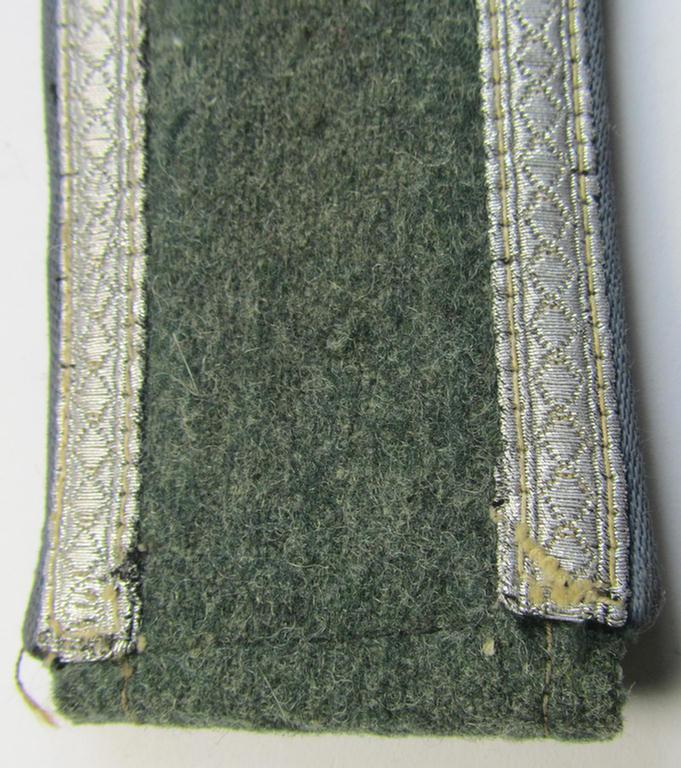 Single, mid-war-period, so-called: 'M43'-pattern, WH (Heeres) NCO-type shoulderstrap as piped in the light-blue-coloured branchcolour as was intended for usage by an: 'Uffz. der Nachschub-Truppen'