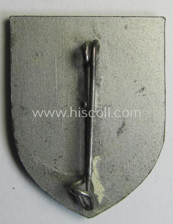 Attractive - and actually quite scarcely encountered! - WH (Heeres) so-called: 'Truppen-Traditionsabzeichen des 215. Infanterie Division' as executed in greyish-coloured zinc-based metal (ie. 'Feinzink')