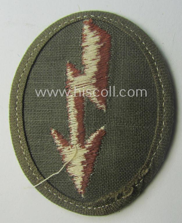 WH (Heeres) 'tropical-styled', trade- and/or special-career insignia (or: 'Signal Blitz') as was intended for a soldier who served within the: 'Kradschützenbtle. der Pz. Div. u. Inf. Divisione (mot.)'