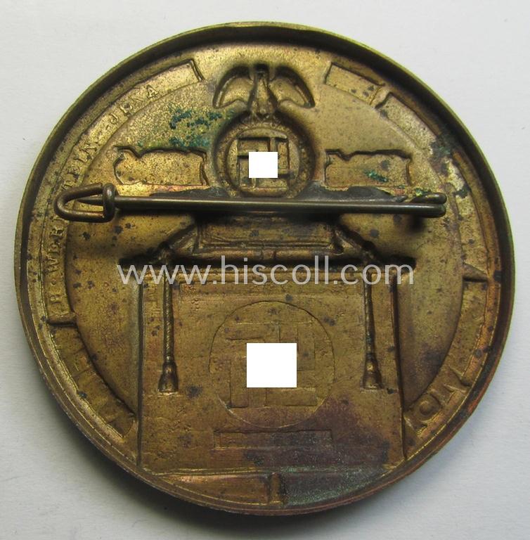 Very detailed, golden-bronze-toned N.S.D.A.P.-related day-badge (ie. 'tinnie' or: 'Veranstaltungsabzeichen') as was issued to commemorate a party-related meeting: '10 Jahrige Wiederkerhr des Reichsparteitages Weimar - 1926-1936'