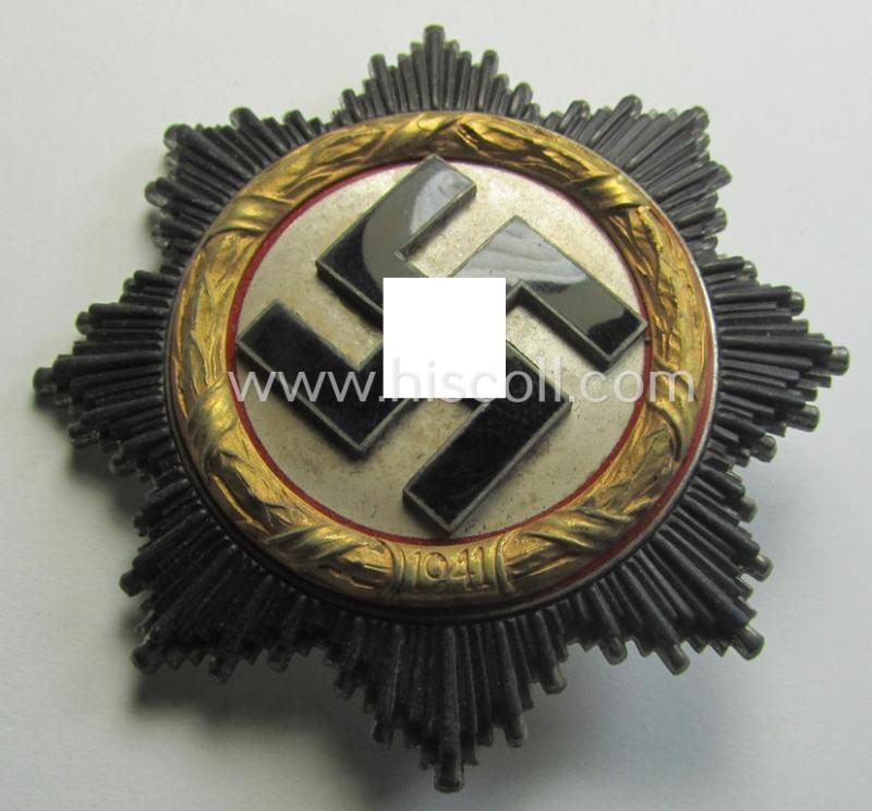 Stunning, maker- (ie. '20'-marked-) example of WH (Heeres, LW etc.) 'Deutsches Kreuz im Gold' (or DKiG) being a (regular- ie. 'light-weight') piece that was produced by the: 'C.F. Zimmermann'-company and that comes stored in its period etui