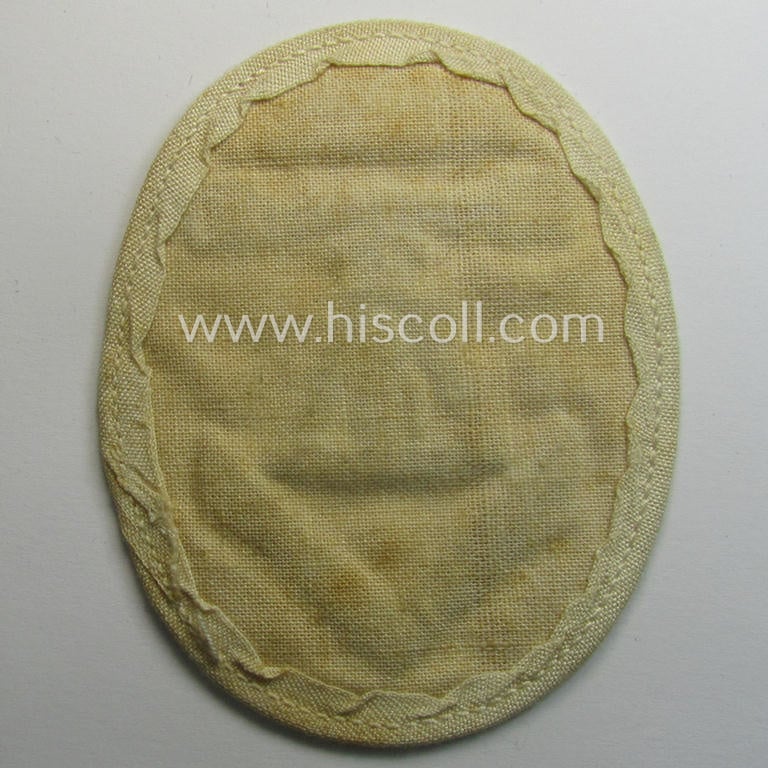 WH (Kriegsmarine) neatly machine-embroidered, so-called: career- ie. specialist-armbadge (ie. 'Tätigkeits-Abzeichen') as was intended to signify the: 'Entfernungsmesser mit Seeziel u. Fla. E.Meßausbildung'