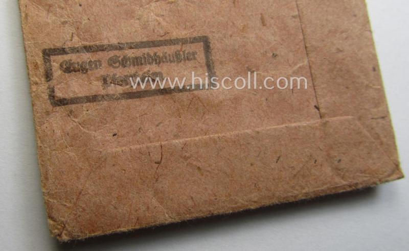Empty 'Zellstoff'-based pouch as was intended for a medal: 'Winterschlacht im Osten 1941/42' as was produced by the: 'Eugen Schmidthaussler'-company (ie. 'Hersteller 28')