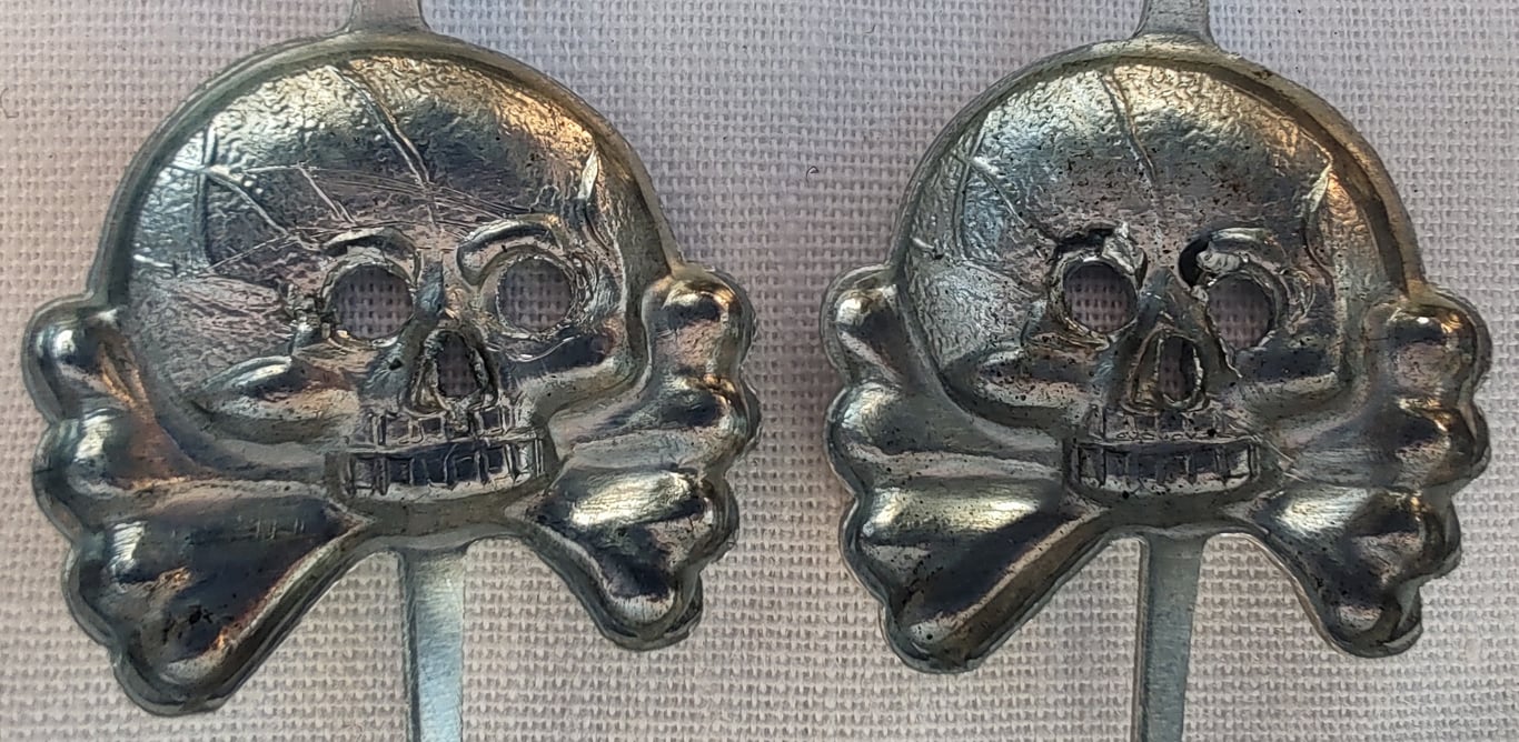 German Wehrmacht Set Of Two Mid-Late War Skulls For Panzer wrap collar tabs.