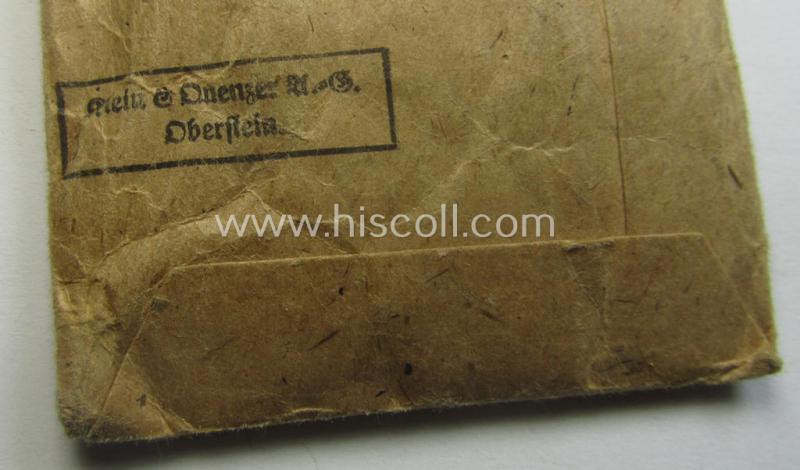 'Verwundeten-Abzeichen in Schwarz' being a clearly maker- (ie. '65'-) marked example by the: 'Klein & Quenzer'-company that came stored its (scarcely seen!) period pouch