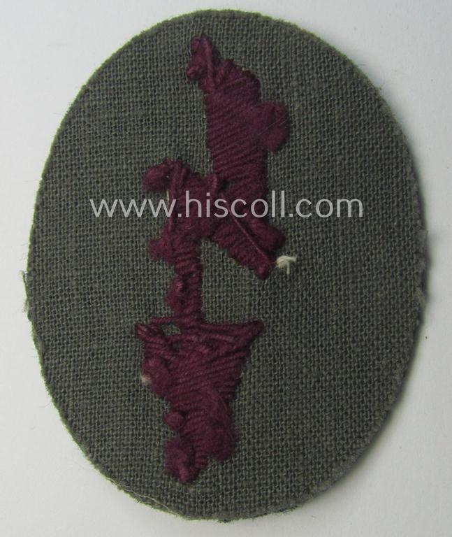 WH (Heeres) trade- and/or special-career-insignia (ie. hand-embroidered 'signal-blitz') as was specifically intended for a soldier within the: '(Nebel)Werfer-Truppen'