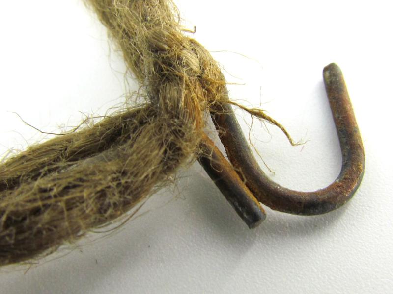 Complete late war German helmet net with attachment hooks