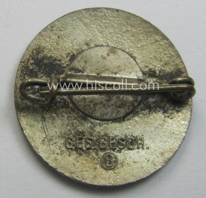 Enamelled membership-pin (ie. 'Mitgliedsabzeichen') as was intended for a member within the: 'Reichsbund der Kinderreichen Deutschlands zum Schutze der Familie' (o. 'RDK') being a red-coloured example as was intended for a: 'Familienwart'