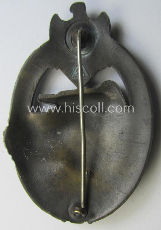 'Panzerkampfabzeichen in Bronze' (or: bronze-class panzer-assault badge or PAB) being a clearly maker- (ie. 'AS' in a triangle-) marked- and/or typical zinc- (ie. 'Feinzink'-) based specimen as was procuced by a to date unknown maker