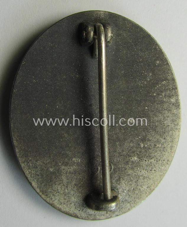 Attractive - and moderately used- and worn! - example of a maker- (ie. '65'-) marked example of a silver-class wound-badge (or: 'Verwundeten-Abzeichen in Silber') as was produced by the 'Hersteller' ie. maker: 'Klein u. Quenzer'