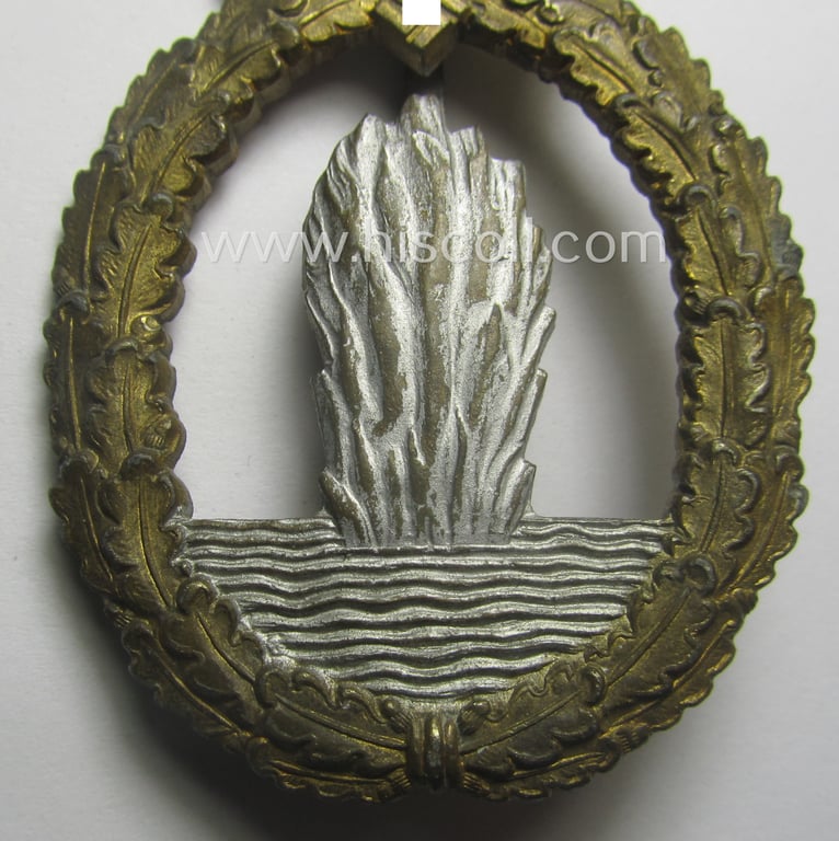 WH (Kriegsmarine) 'Kriegsabzeichen für Minensuch-, U-Boot-Jagd und Sicherungs-Verbände' being a very detailed and neatly maker- (ie. R.K.-) marked and/or: 'Feinzink'-based example