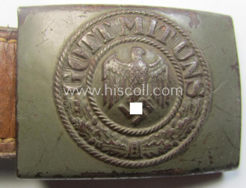 WH (Heeres) field-grey-toned- and steel-based belt-buckle being a maker- (ie. 'R.S.&S.'-) marked example that comes mounted onto its 'R. Sieper u. Söhne'-marked and/or '1940'-dated tab