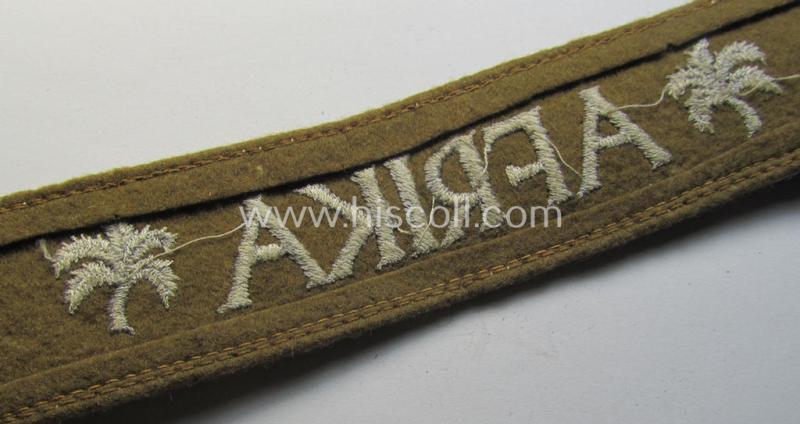 Attractive, WH (LW o. Heeres) cuff-title (ie. 'Ärmelstreifen') entitled: 'Afrika' (being a full-length example that comes in an issued-, used and/or carefully tunic-removed, condition)