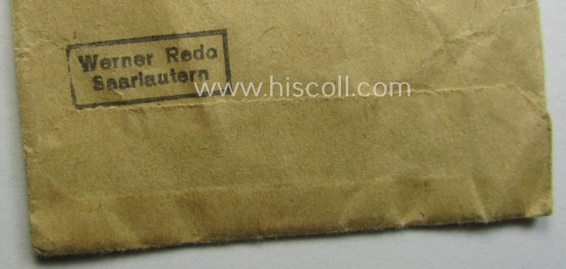 Empty 'variant'-pattern, 'Zellstoff'-based pouch as was intended for a medal: 'Winterschlacht im Osten 1941/42' as was produced by the company: 'Werner Redo' (ie. 'Hersteller 88')