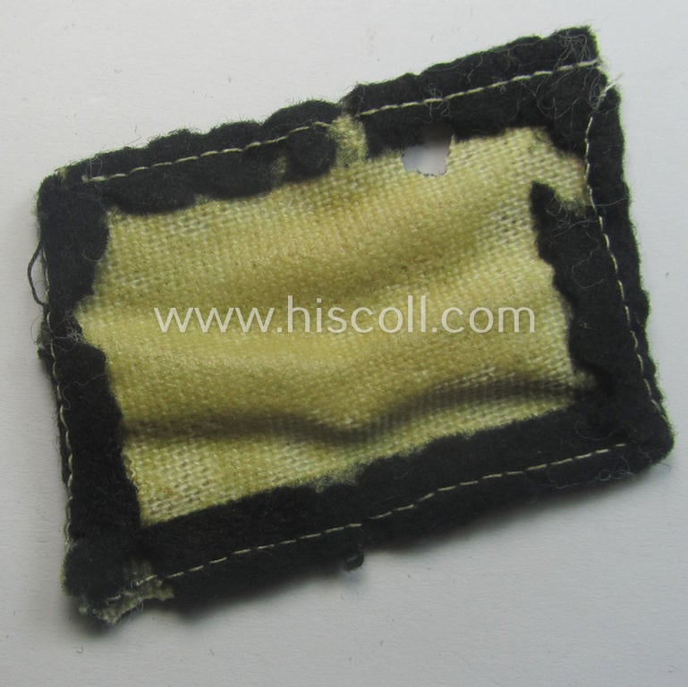 'Relic'- ie. moth-damaged example of an (I deem early- ie. mid-war-pattern) 'SS'- (ie. 'Waffen-SS'-) so-called: 'RzM-style'-collar-tab (being a so-called: 'pumpkin-head-variant') for usage within the: '3. SS-Panzer-Division' “Totenkopf”