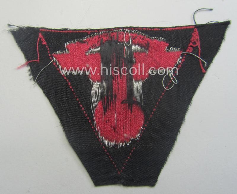 Never used - ie. 'virtually mint'! - so-called: N.S.K.K. (ie. 'National Soc. Kraftfahr Korps') side-cap-eagle (ie. 'Adler für Schiffchenmütze') being a 'flat-wire-woven'-example that comes mounted onto a pinkish-red-coloured background