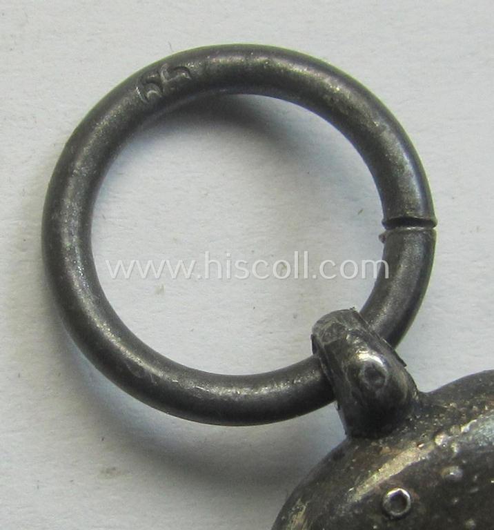 Attractive medal-set: 'Winterschlacht im Osten 1941-42' being a maker- (ie. '65'-) marked- (and/or 'Feinzink'-based) specimen by the maker: 'Klein & Quenzer' and that comes together with its (non-confectioned) ribbon (ie. 'Bandabschnitt')