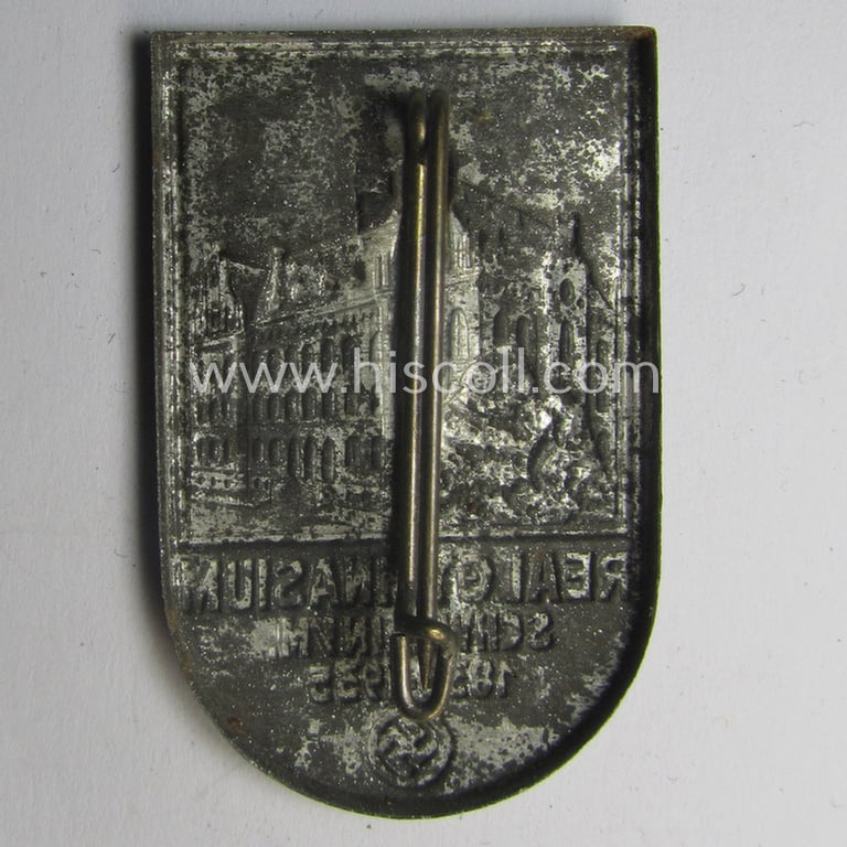 Commemorative, N.S.D.A.P.-related 'tinnie' depicting an illustration of a schooling-institute coupled with the text: 'Realgymnasium Schwerin i/M. - 1835-1935'