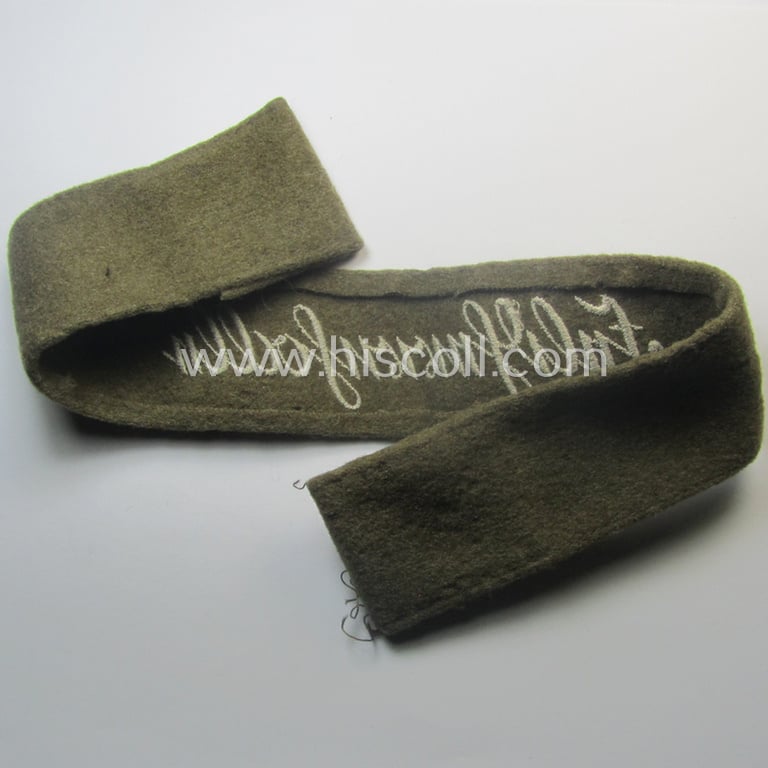 Never before seen - full length and with certainty scarcely encountered! - WH (Heeres) woolen-based so-called: 'FHH-Ärmelstreifen' (ie. cuff-title) as was intended for the soldiers- (ie. NCOs) serving within the: '60. Pz-Gren.-Div.' “Feldherrnhalle”