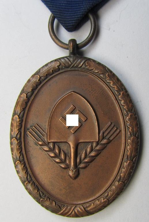 Attractive example of a: RAD (ie. 'Reichsarbeitsdienst') so-called: 'Dienstauszeichnung 4. Stufe für Männer' as was intended for 4 years loyal-service and that comes mounted onto its period piece of ribbon (ie. 'Bandabschnitt')