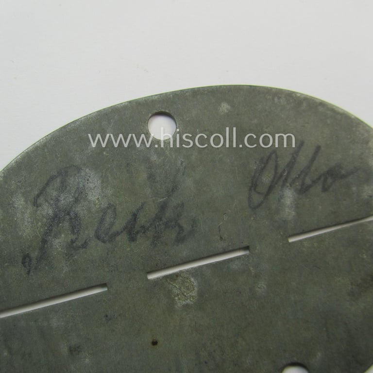 Zinc-based, WH (Heeres) 'Gebirgsjäger'-related ID-disc bearing the clearly stamped unit-designation that reads: '8./Geb.Jäg.E.Btl. 98' and that comes as issued and/or worn