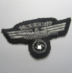 N.S.K.K. (ie. 'National Socialistisches Kraftfahr Korps') arm-eagle as...