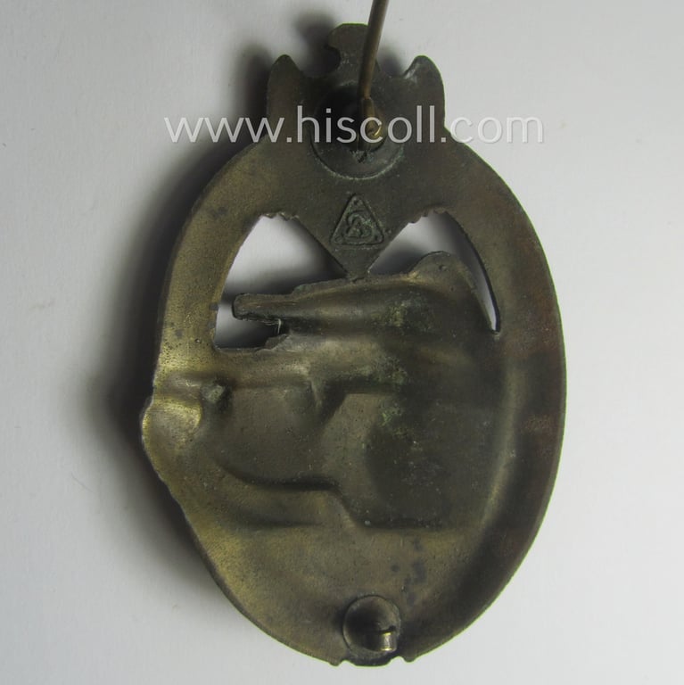 'Panzerkampfabzeichen in Bronze' (or: bronze-class panzer-assault badge or PAB) being a clearly maker- (ie. 'AS' in a triangle-) marked- and/or typical zinc- (ie. 'Feinzink'-) based specimen as was procuced by a to date unknown maker
