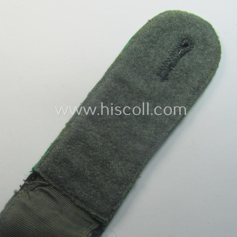 Single, WH (Heeres) EM-type (ie. 'M40'-pattern- and/or 'rounded-styled') neatly 'cyphered' shoulderstrap as was intended for usage by a: 'Soldat eines Gebirgsjäger-Rgts.'