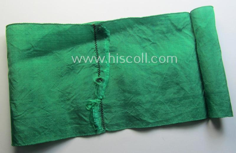 DRB- (ie. 'Deutsche Reichsbahn'-) related armband entitled: 'Reichsbahn' being of the 'entirely-woven'-type onto (typical) silk-like cloth in a technique similar to the 'BeVo'-weave pattern