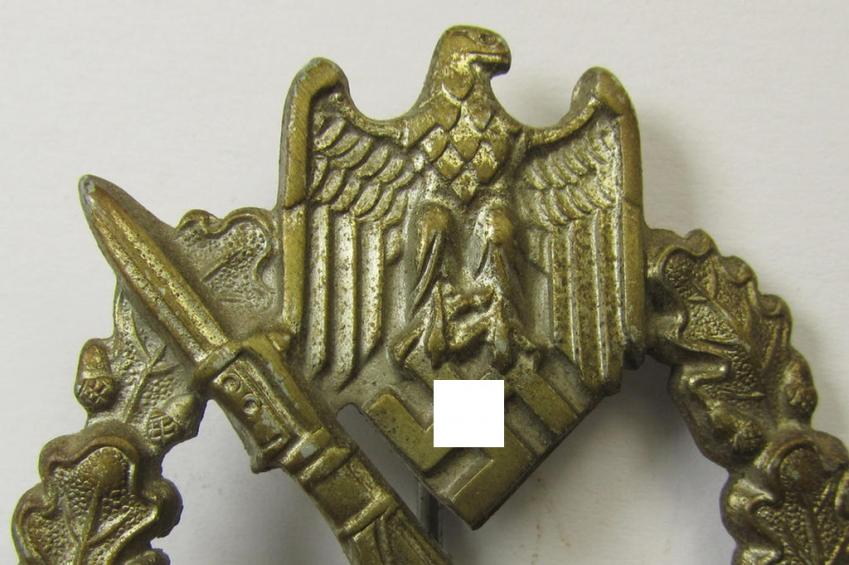 Attractive, 'Infanterie Sturmabzeichen in Silber' being a scarcely seen, non-maker-marked- and/or zinc- (ie. 'Feinzink'-) based specimen as was presumably procuded by the desirable maker (ie. 'Hersteller') named: 'Ernst L. Müller'