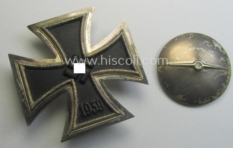 'EK 1. Klasse' (or: Iron Cross 1st class) as executed in the scarcely seen so-called: 'screw-back'-pattern being a non-marked example that comes stored in its accompanying etui