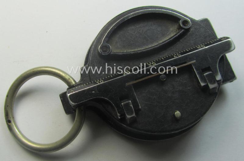 Pre-war-period, 'standard-issue'-pattern and/or (typical) black-coloured (and/or aluminium-based) WH compass (ie. 'Marschkompass') which is nicely maker- (ie. 'Busch - D.R.G.M.'-) marked and/or individually numbered: '106302'