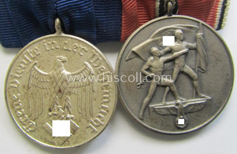 Attractive example of a two-pieced medal-bar (ie.: 'Doppel- o. Ordenspange') resp. showing a: 'WH-DA 4. Stufe' (with firmly attached eagle-device) and an Austrian 'Anschluss'-medal '1 März 1938'