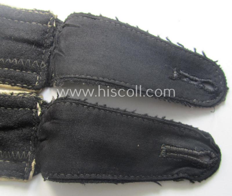 Pair of Waffen-SS NCO-type shoulderstraps as piped in the white-coloured branchcolour as was intended for usage by an: 'SS-Unterscharführer' who served within the: 'Waffen-SS Infanterie-Trpn.'