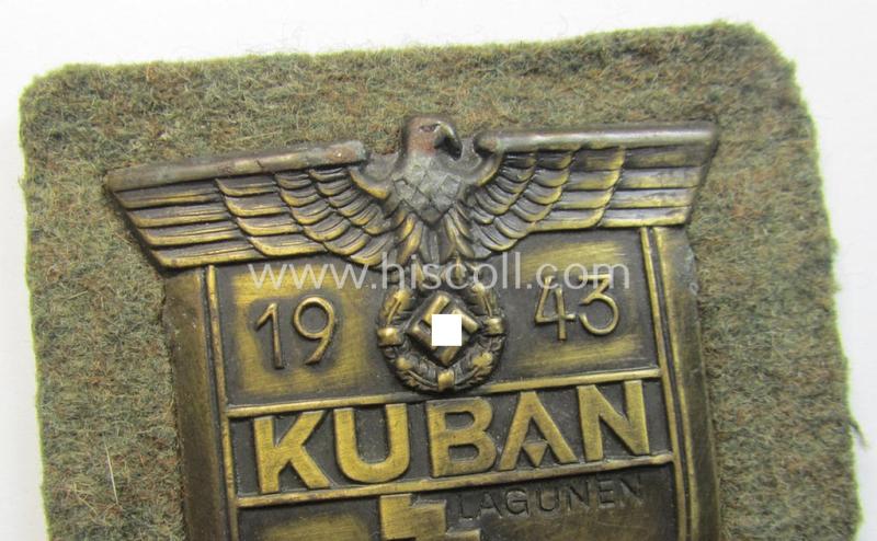Very attractive - and actually scarcely encountered! - WH (Heeres ie. Waffen-SS) 'Kuban'-campaign-shield that comes mounted onto its original field-grey-coloured- and/or woolen-based 'backing'