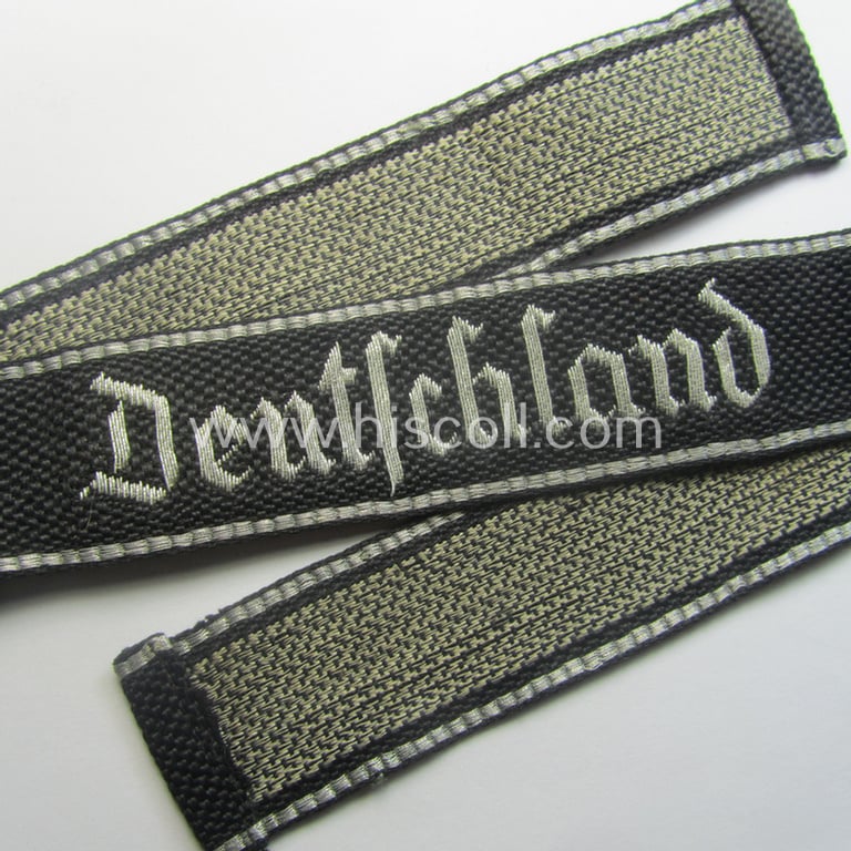 Stunning, Waffen-SS officers'-type, 1939/40-pattern cuff-title (ie. 'Ärmelstreifen') as executed in flat-wire 'BeVo'-weave-pattern (in Gothic-styled script!) for an officer within the: SS-Rgt. 'Deutschland' (2. SS-Pz-Div. "Das Reich")