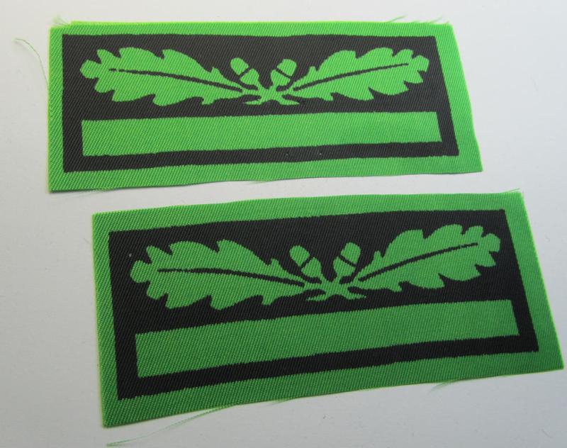 Attractive - and fully matching! - pair of officers'-pattern, WH (Heeres o. Waffen-SS) rank-insignia-bars (for usage on the various camouflaged-uniforms) as was used by an officer holding the rank of: 'Leutnant' (ie.: 'SS Untersturmführer')