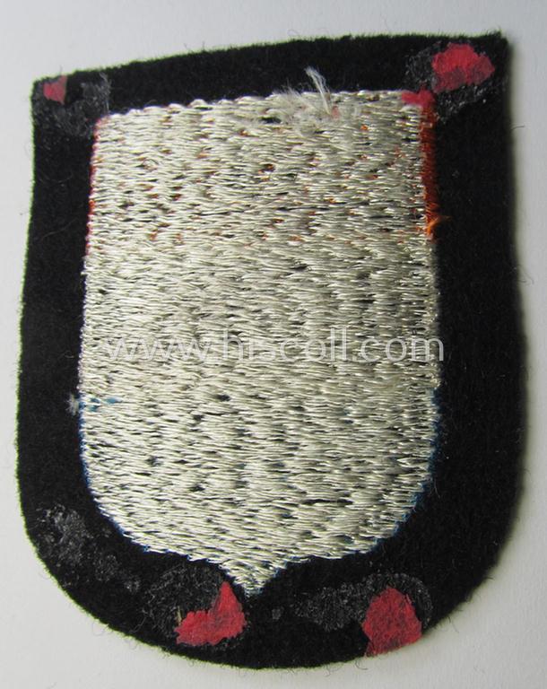 Dutch, Waffen-SS 'volunteer' arm-shield as was specifically intended for usage by soldiers of the: '23. SS Freiwilligen Panzer Grenadier Division' ('Nederland') that comes in a 'virtually mint- ie. unissued', condition