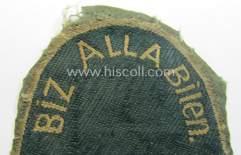 Truly worn 'BeVo'-type armshield (of the first pattern!) entitled: 'Biz Alla Bilen - Turkistan' (being a piece that was intended for a volunteer who served within the: 'Deutsche Wehrmacht' ie. within the: 'Turkistanisches Legion')
