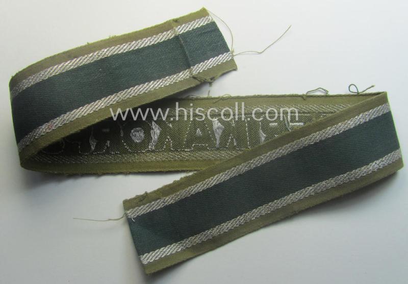 Truly worn, 'BeVo'-like cuff-title (ie. 'Ärmelstreifen') entitled: 'Afrikakorps' being a with certainty issued example that comes in an overall nice- (ie. hardly shortened- and/or once tunic-attached-), condition