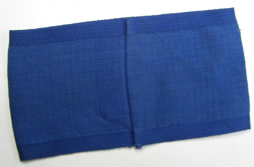 Linnen-based- and/or partly woven-style-, darker-blue-coloured armband (ie. 'Armbinde') depicting a capital 'O'-character, as was presumably intended for staff-members of the German RLB (ie. 'Reichsluftschutz-Bund')