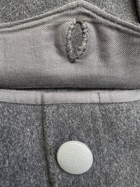 DRK (Deutsches Rotes Kreuz)  Vorhelfer service tunic with original insignia and armband.