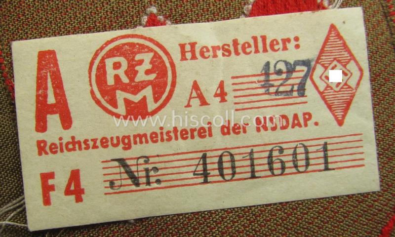 Attractive, DJ (ie. 'Deutsches Jungvolk') arm-badge as was intended for usage by a member who served within the: 'Oberbann 1' (being a 'virtually mint- ie. unissued' example that still shows its 'RzM'-etiket)