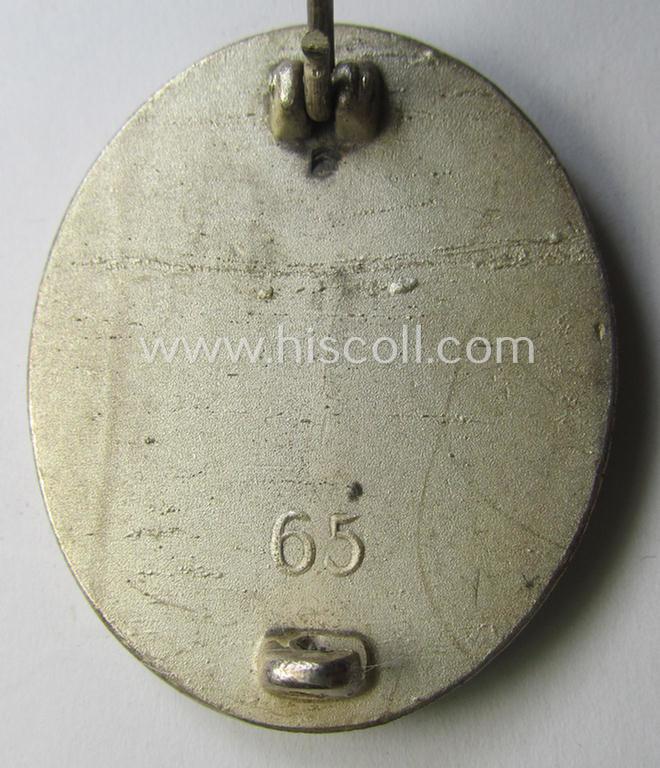 Silver-class wound-badge (or: 'Verwundeten-Abzeichen in Silber') being a maker- (ie. '65'-) marked example as was produced by the 'Hersteller' ie. maker: 'Klein u. Quenzer'