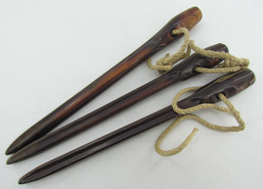 Matching set of 3 Bakelite tent pegs